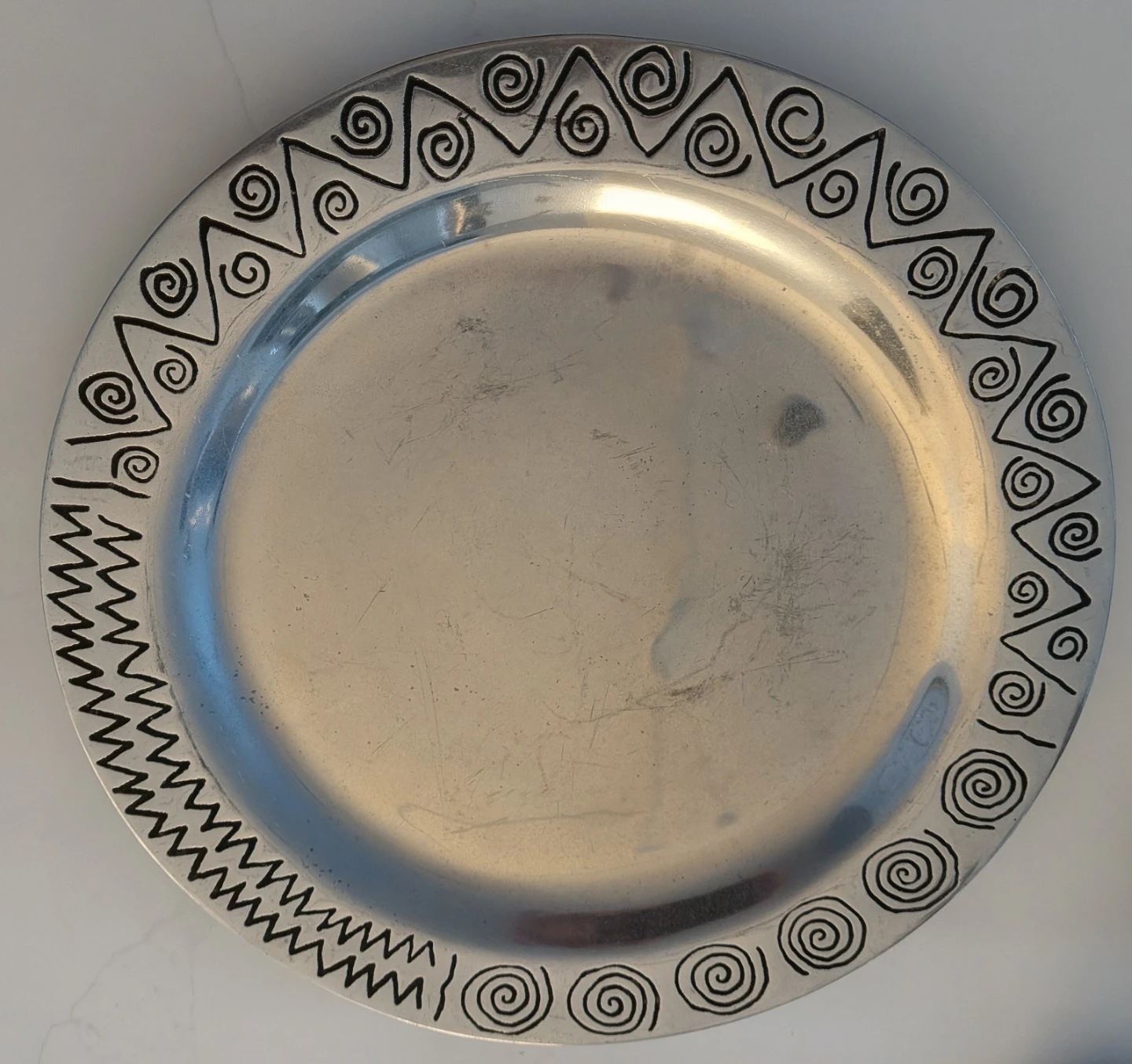 Metal Plate with Spiral Design