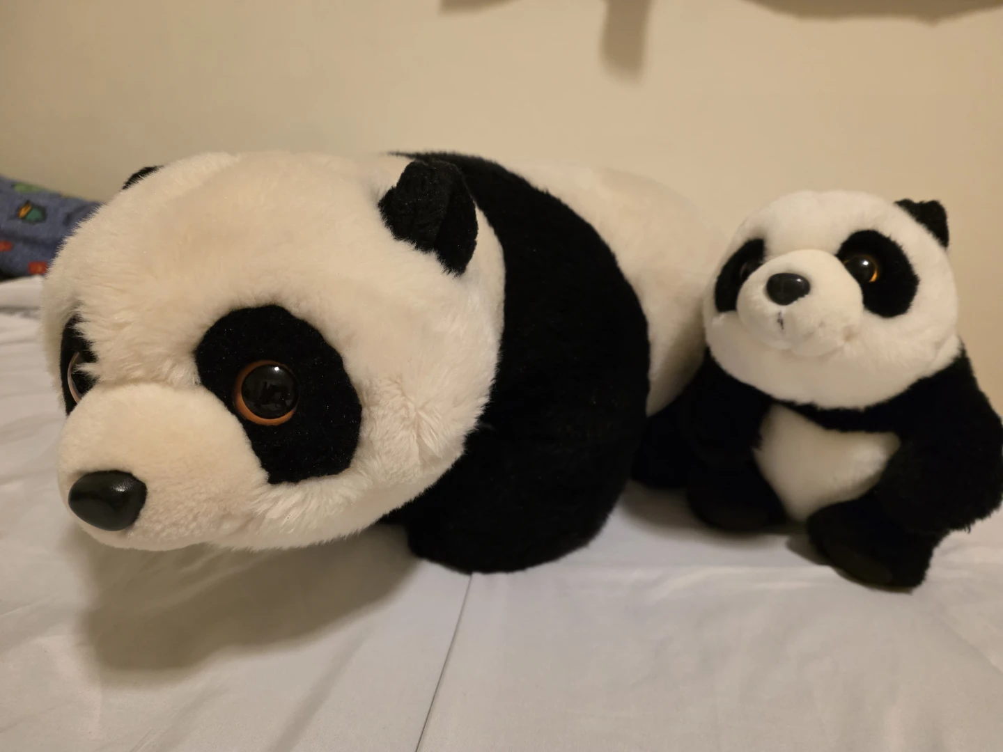 Two plush panda toys ( mom and baby panda)