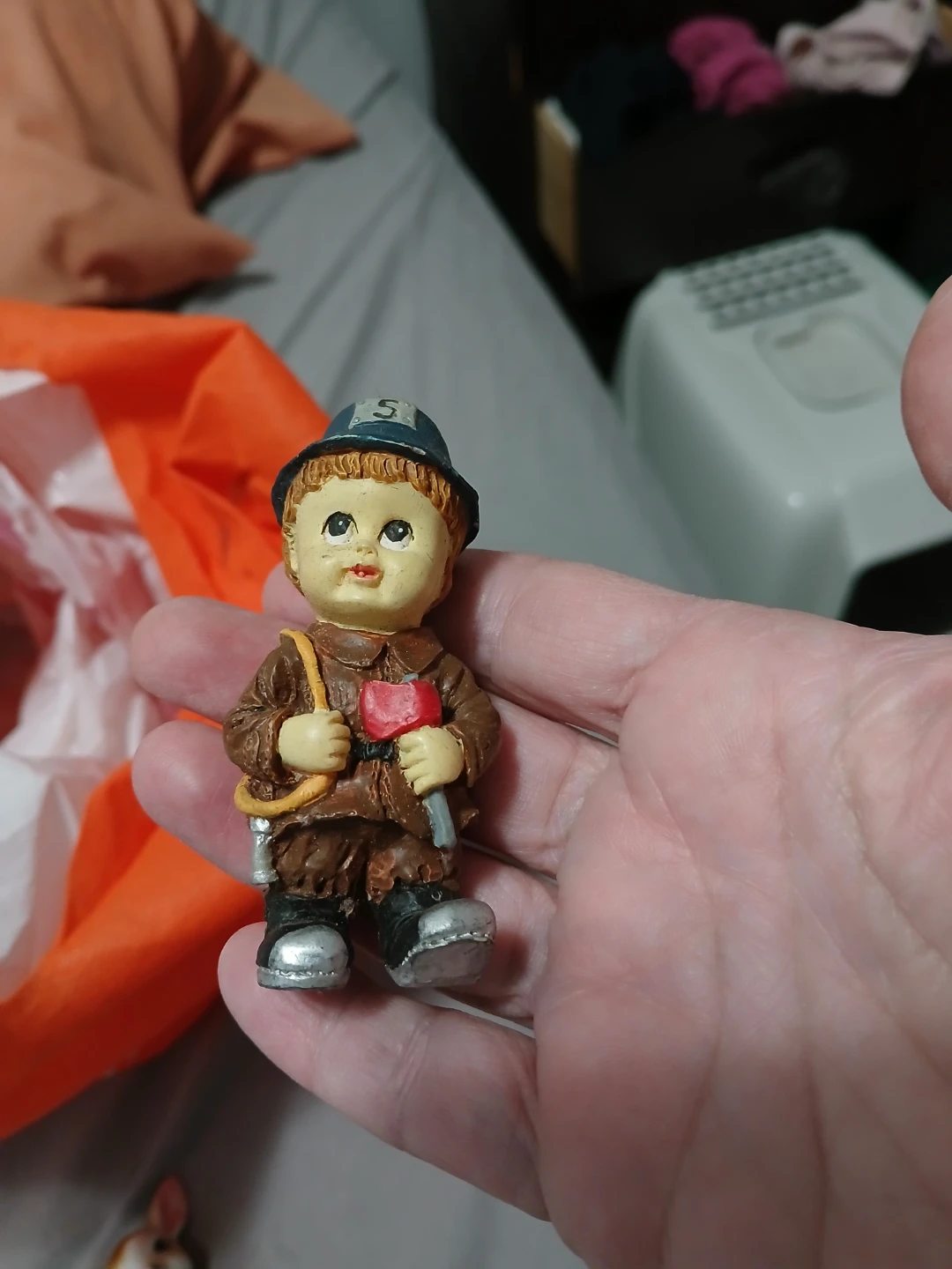 Vintage firefighter figurine