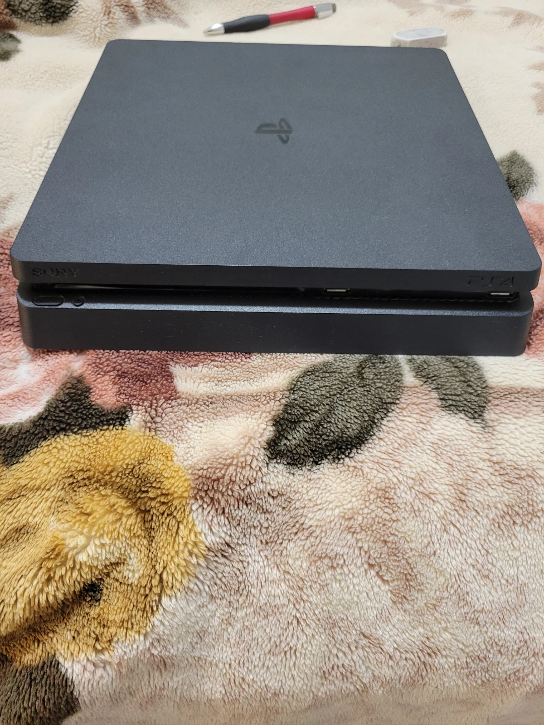 Sony PlayStation 4 Slim Console with 2 Controllers - photo 2