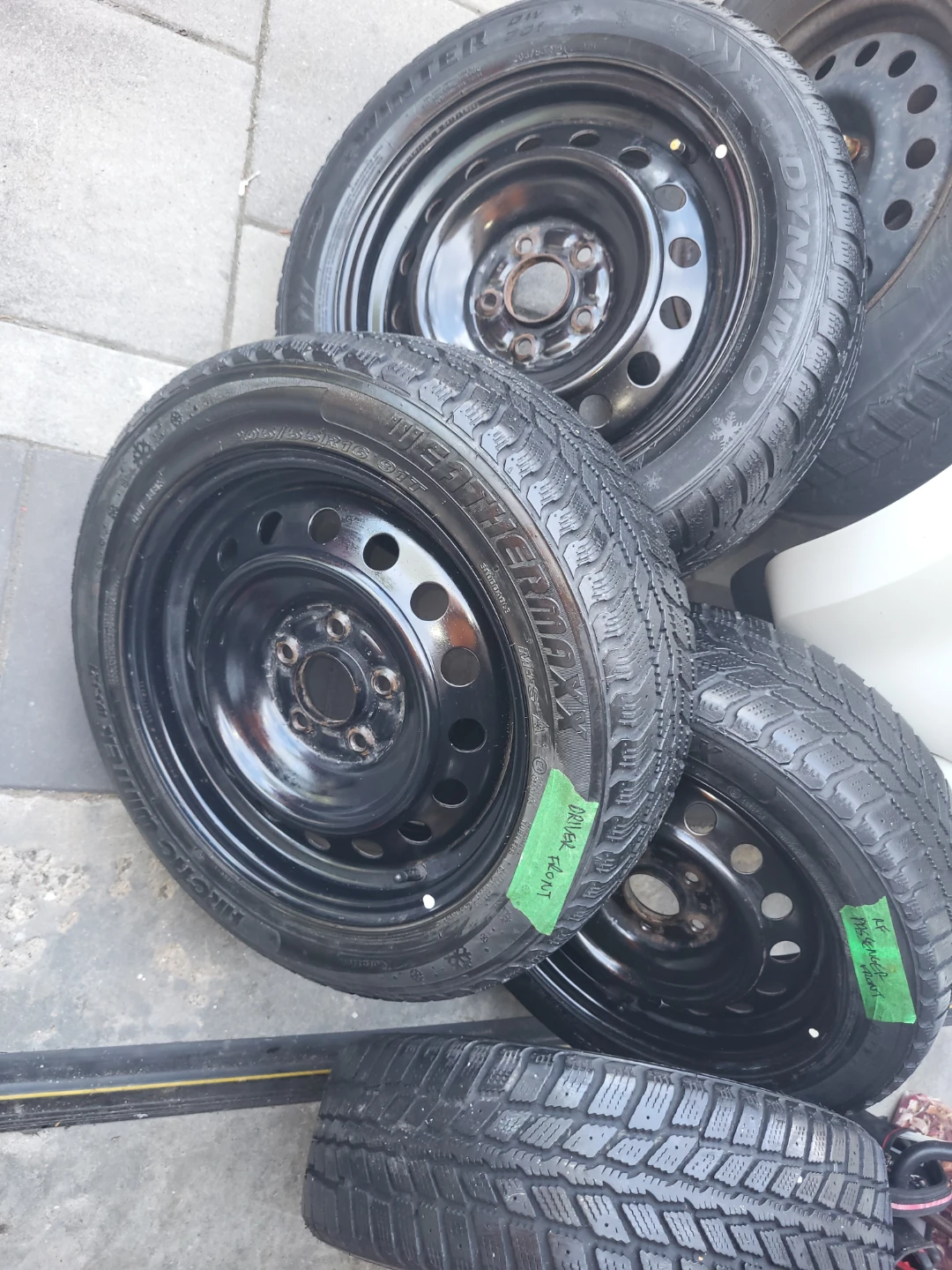 Set of four winter tires mounted on black steel - photo 3