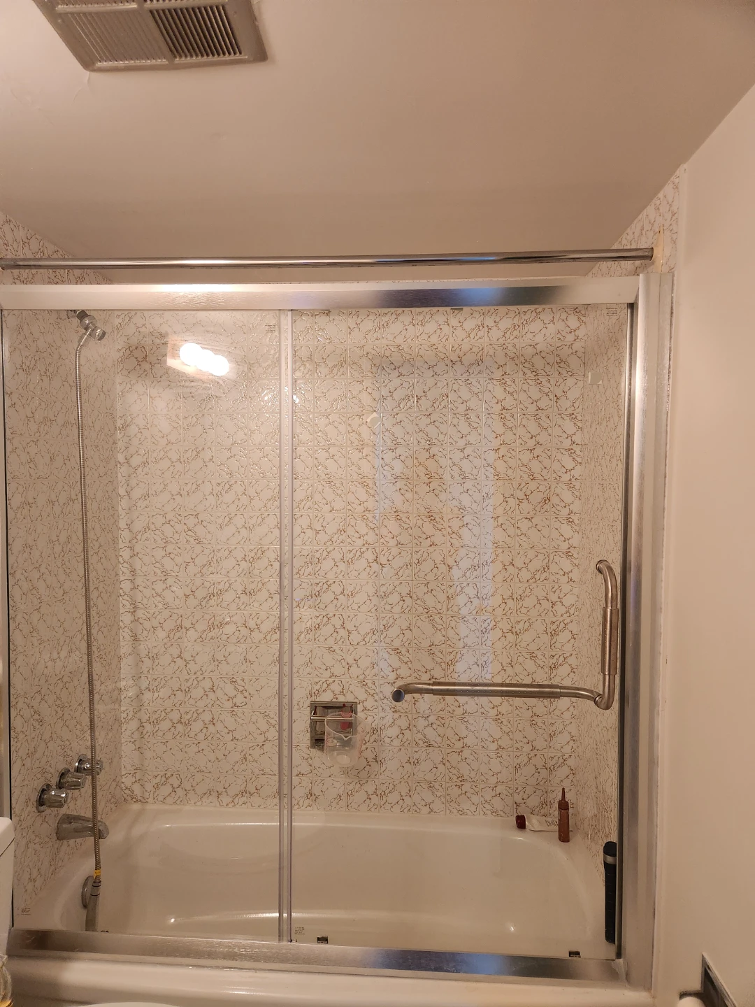 Sliding glass bathtub shower doors