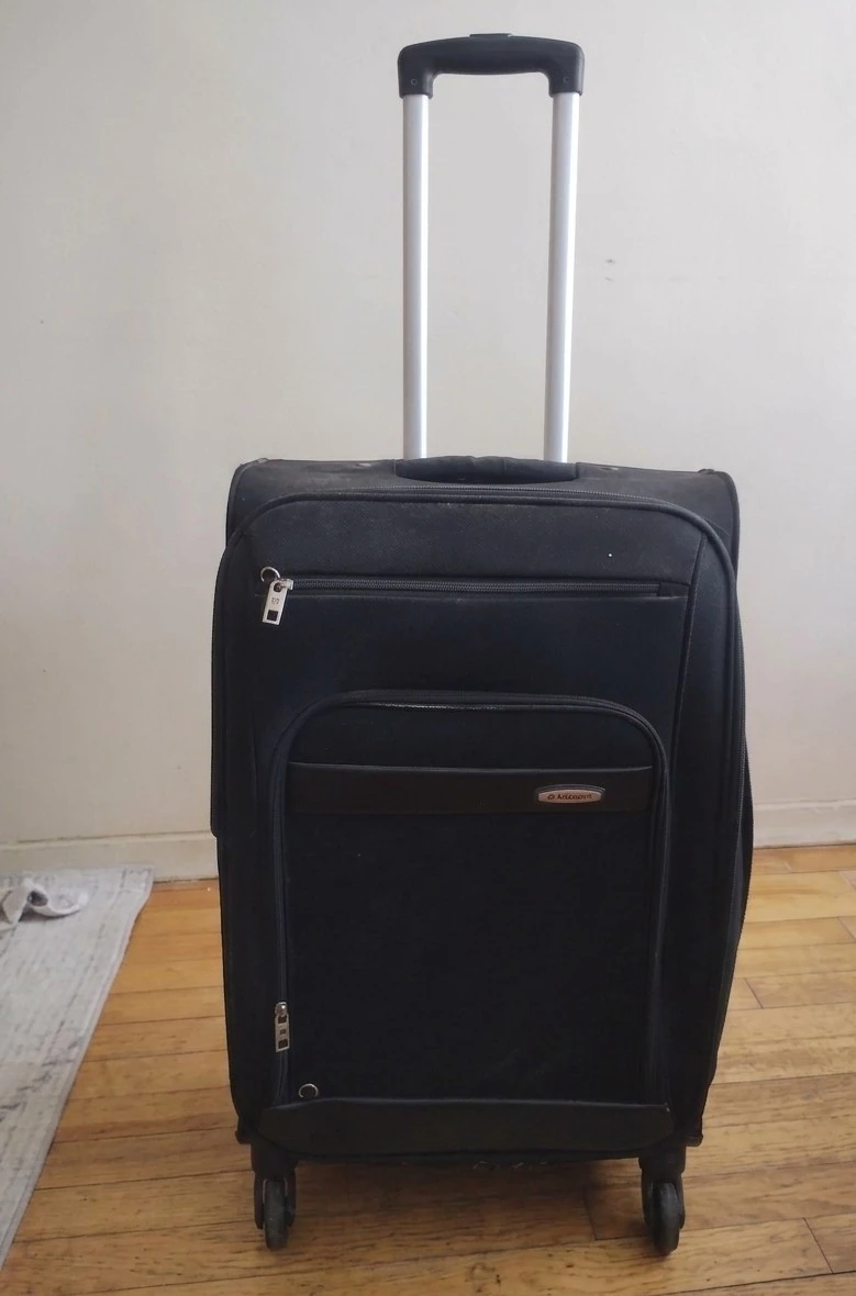 Black Rolling Suitcase (Needs Wheel Repair or Good for Storage) - photo 2