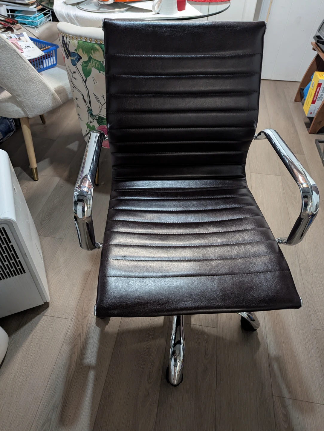 Brown office chair with chrome frame