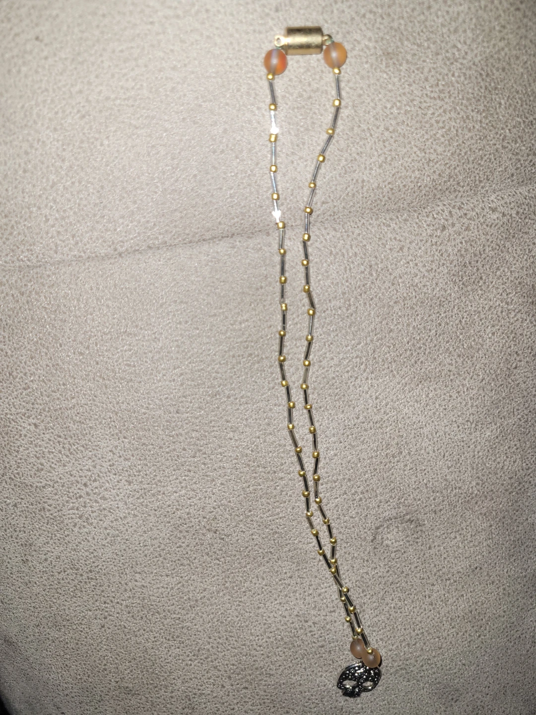 Beaded skull pendant necklace