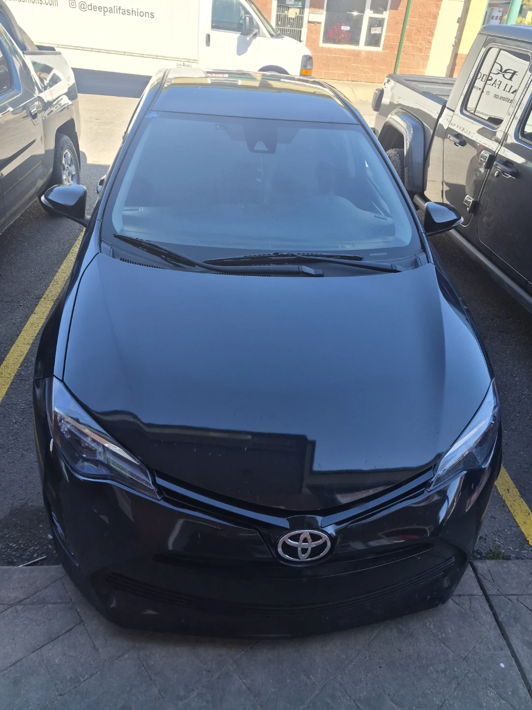 Black Toyota Corolla SE