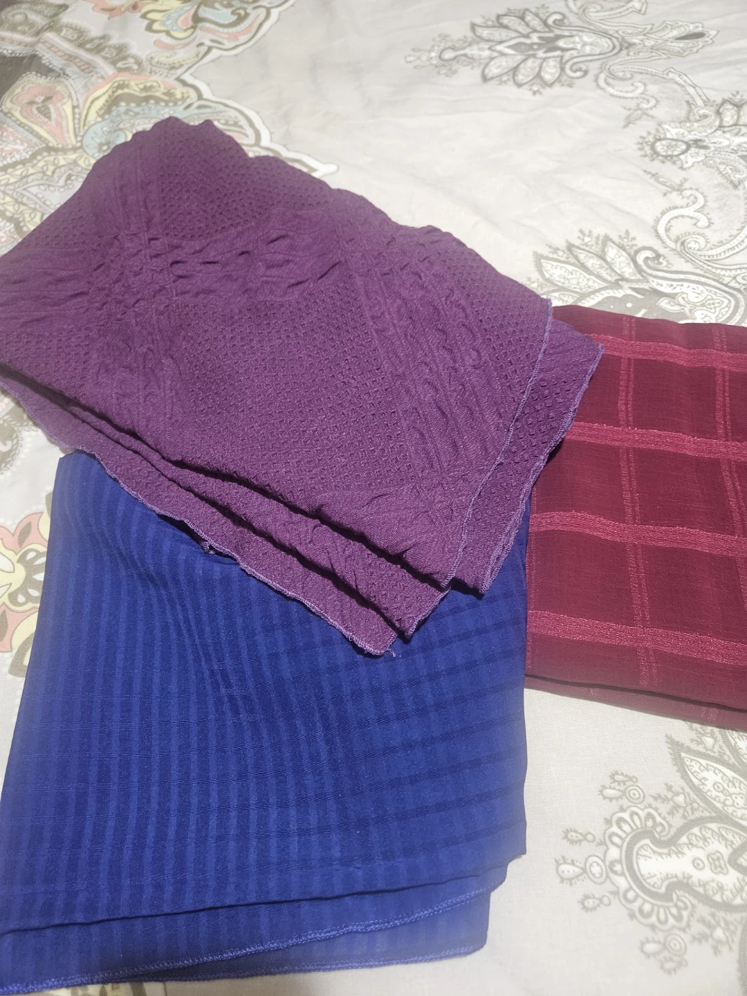 Set of three textured scarves