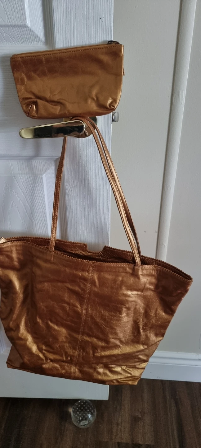 Latico metallic bronze tote with matching pouch
