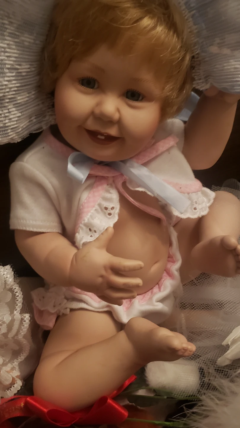 Porcelain Baby Doll with Lace Hat