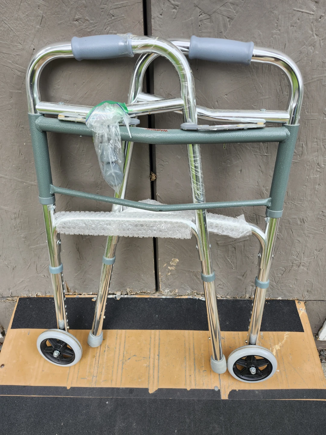Folding Walker with Wheels (almost new)