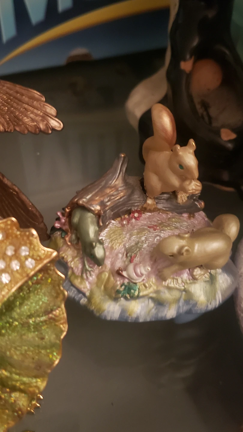 Decorative squirrel and animal figurine