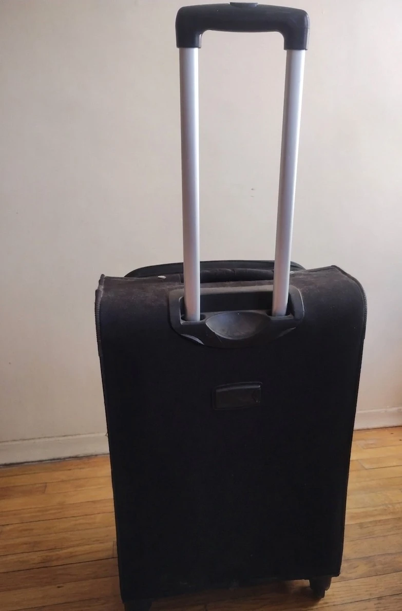Black Rolling Suitcase (Needs Wheel Repair or Good for Storage)