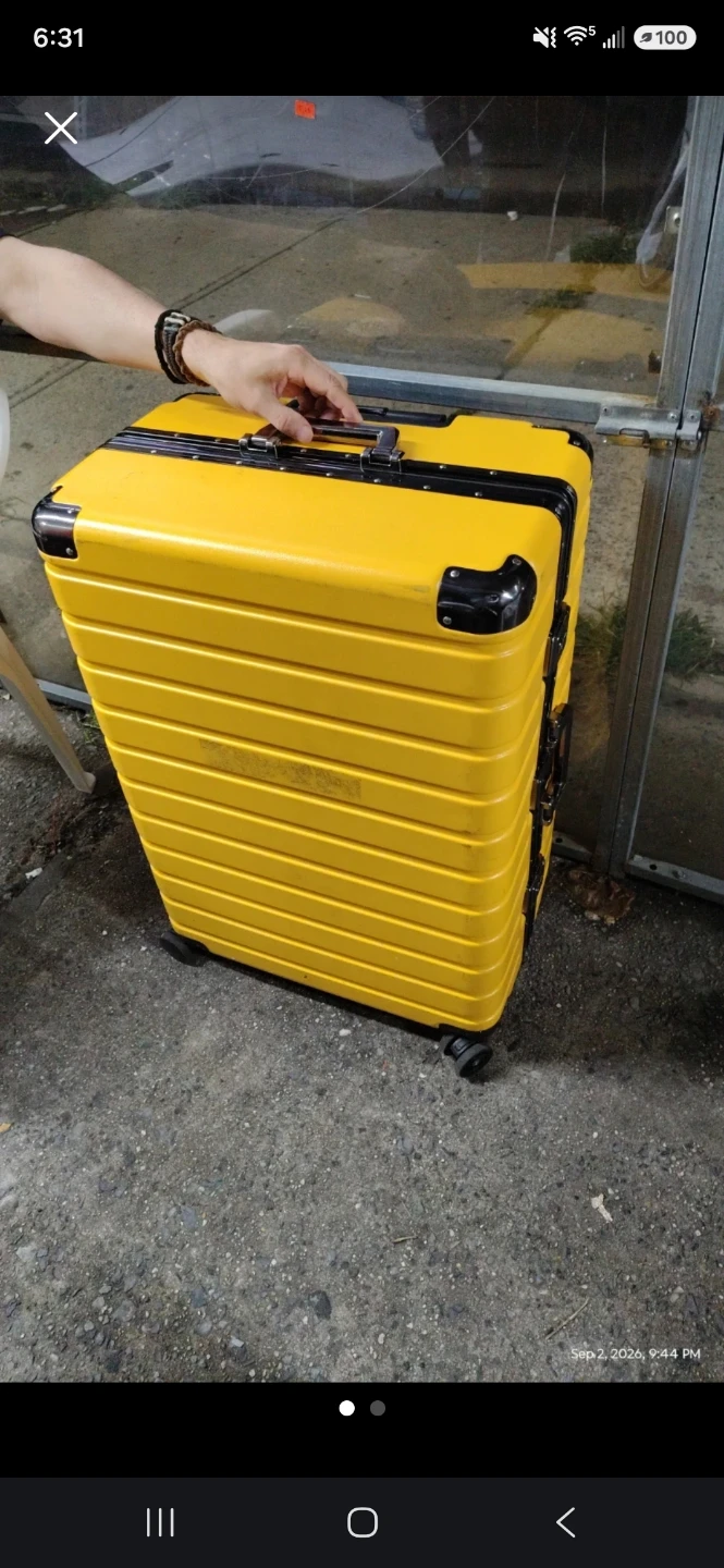 Yellow Hardshell Rolling Luggage