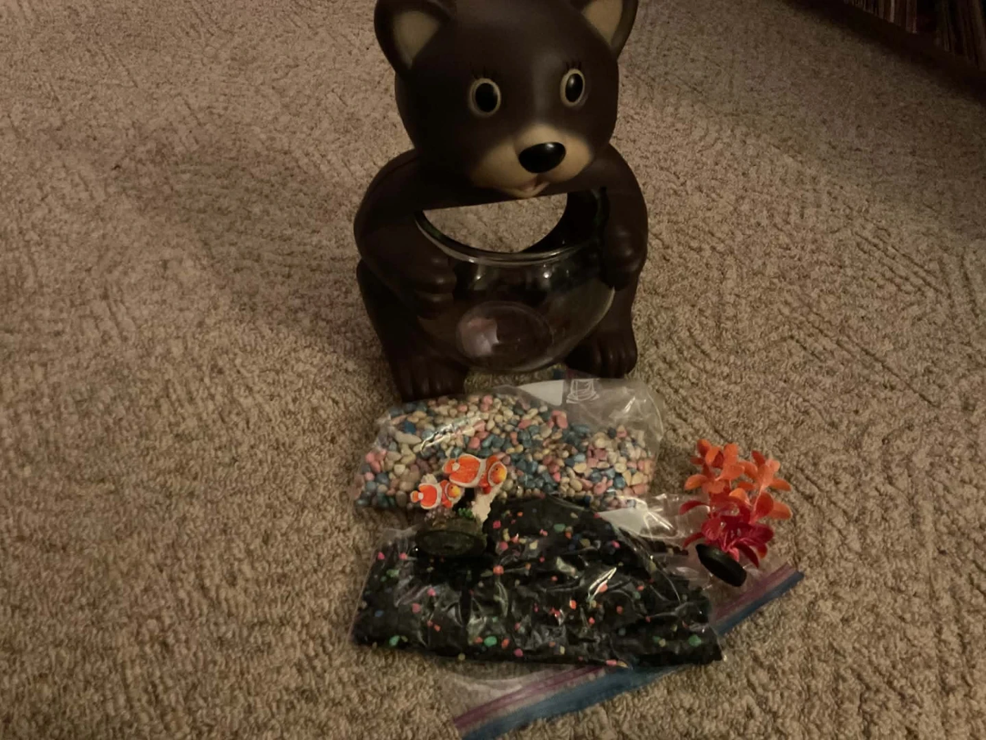 Bear-themed fish bowl with accessories