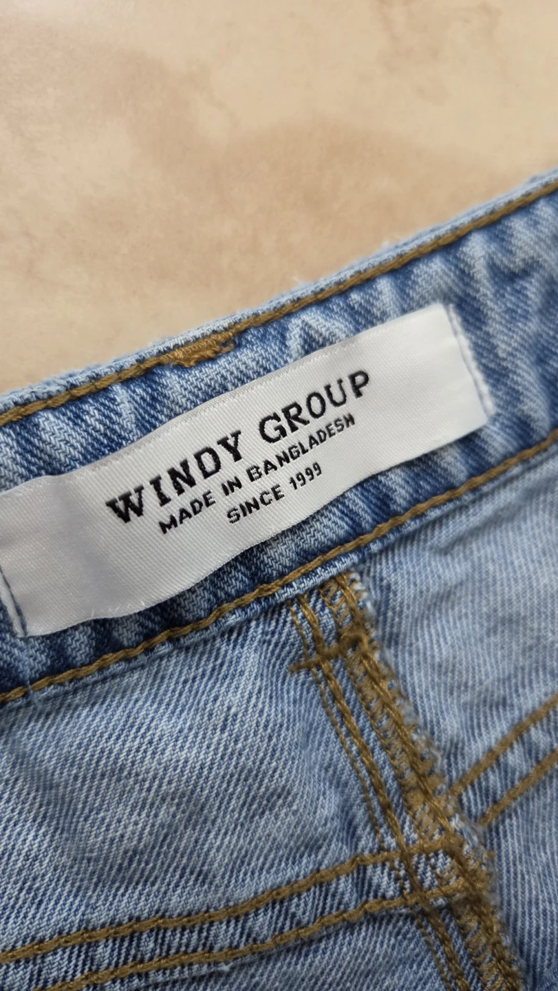 Windy Group Distressed Wide-Leg Jeans - photo 2