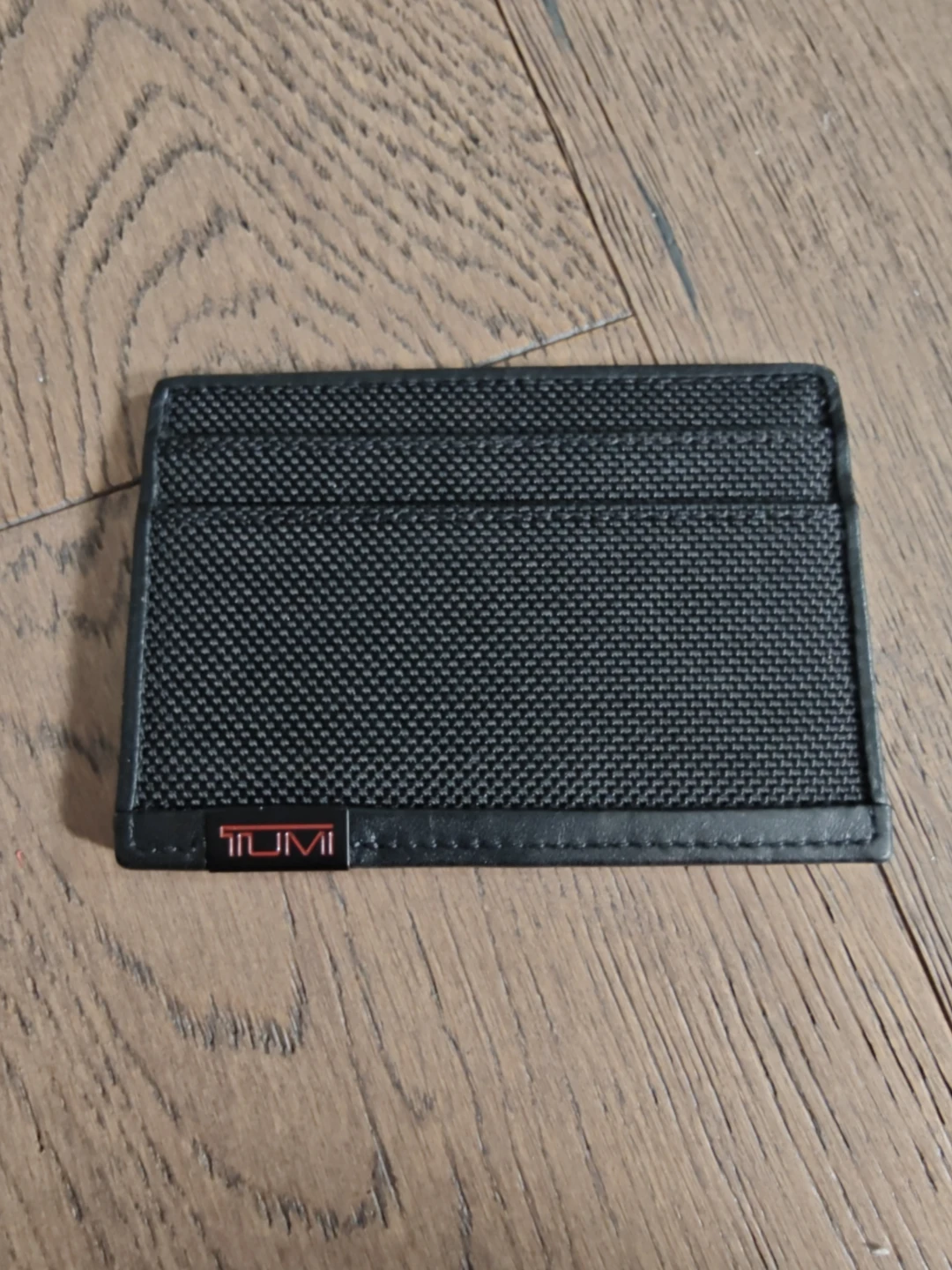 TUMI black card holder