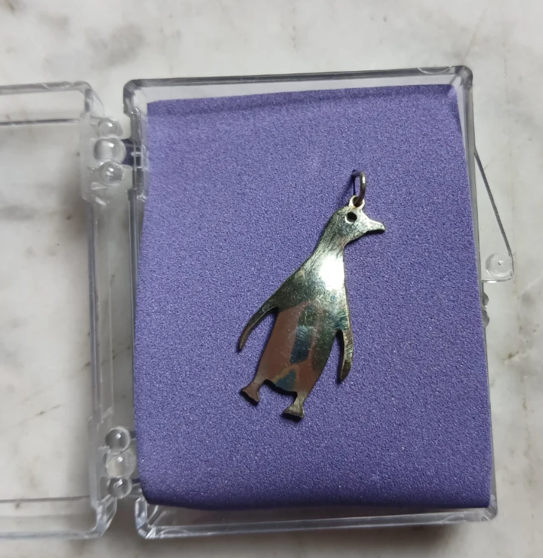 Silver penguin charm