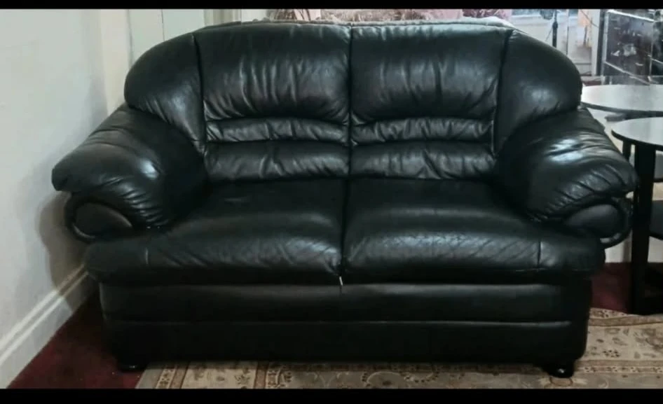 Black Leather Two-Seater Sofa