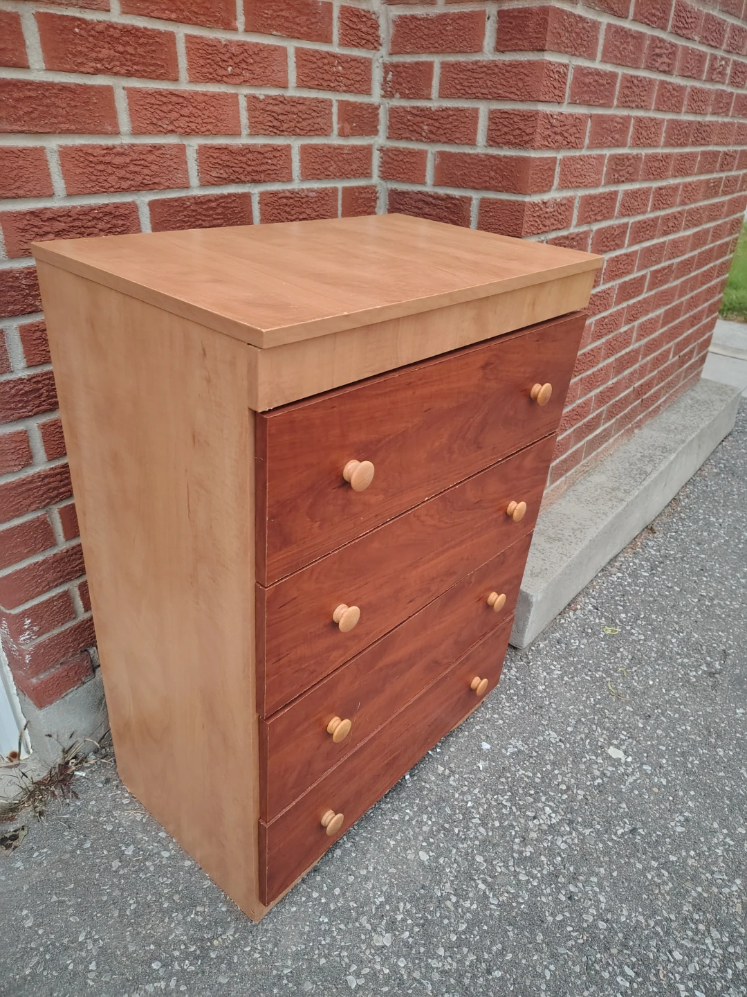 Four-drawer dresser with wooden knobs