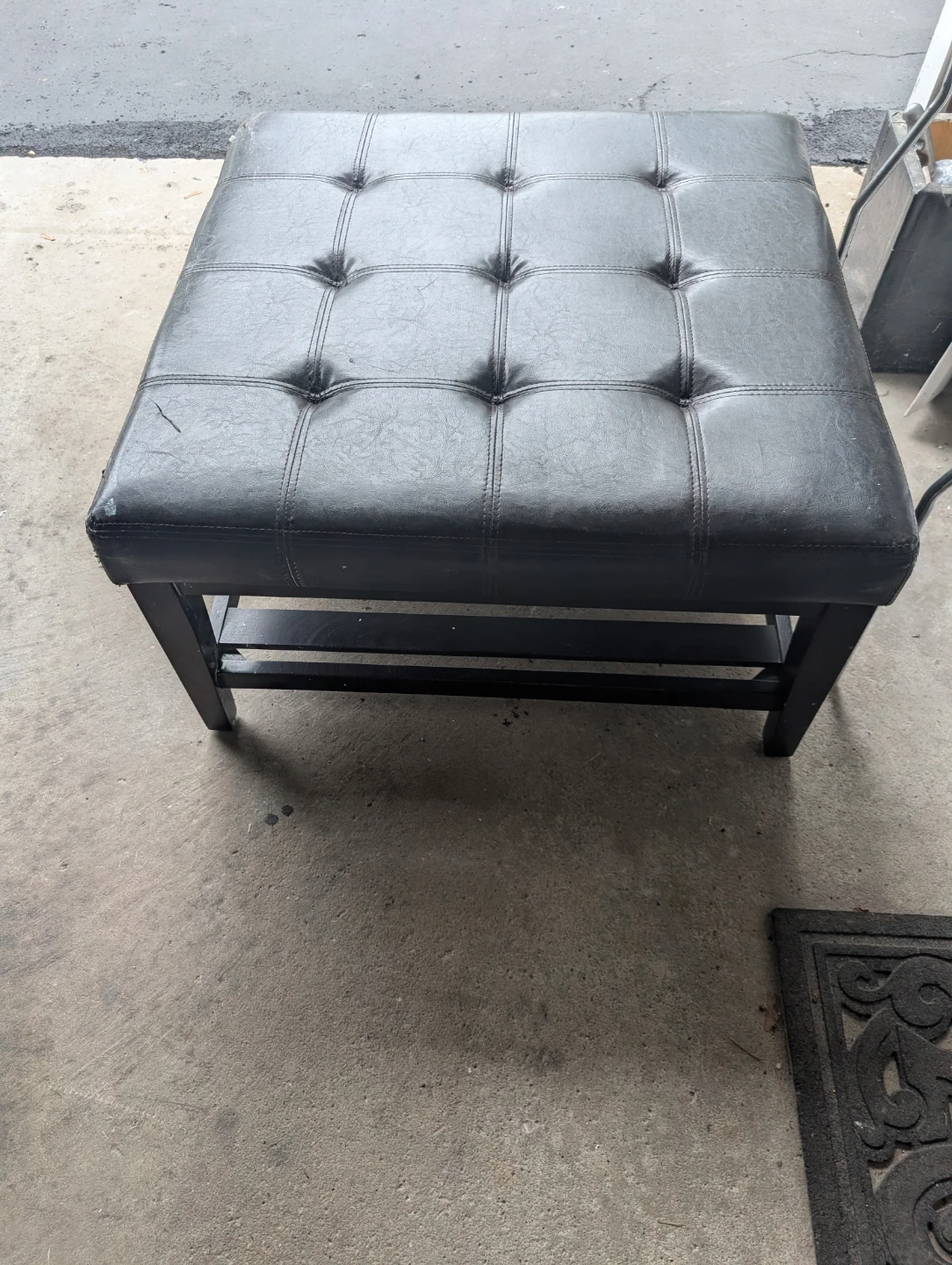 Black Tufted Faux Leather Ottoman pick up as it is