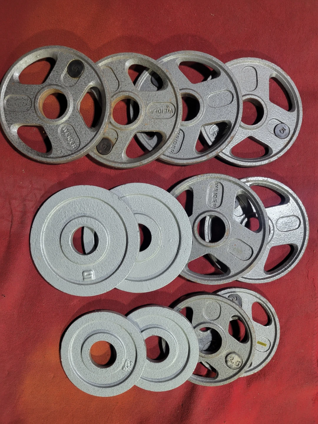 OLYMPIC.  2" HOLE  50LB PLATES TOTAL MIXED BRANDS
