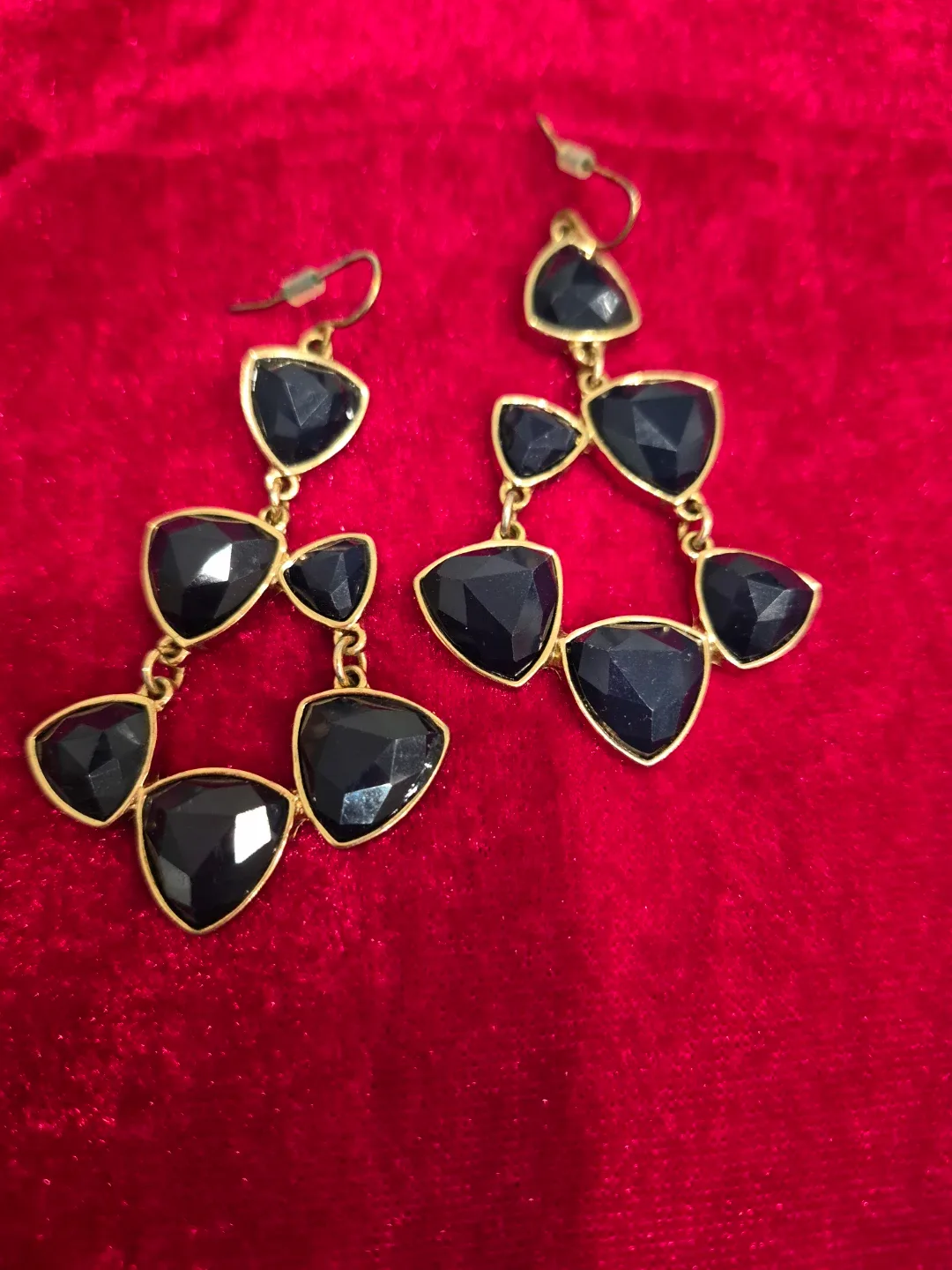 Black and gold tone triangular drop earrings