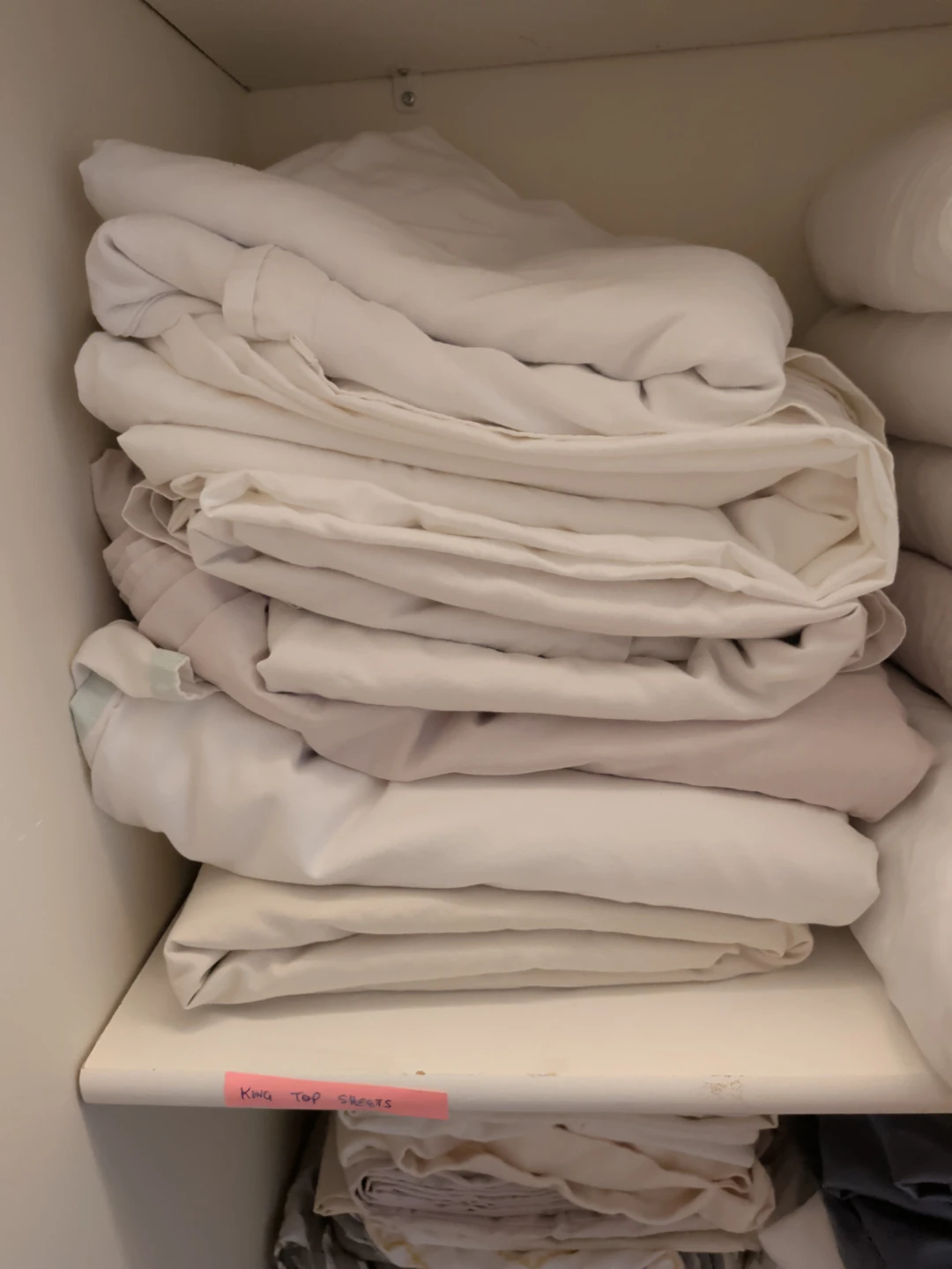 Assorted King Size Top Sheets, Fitted Sheets, and Pillow Cases