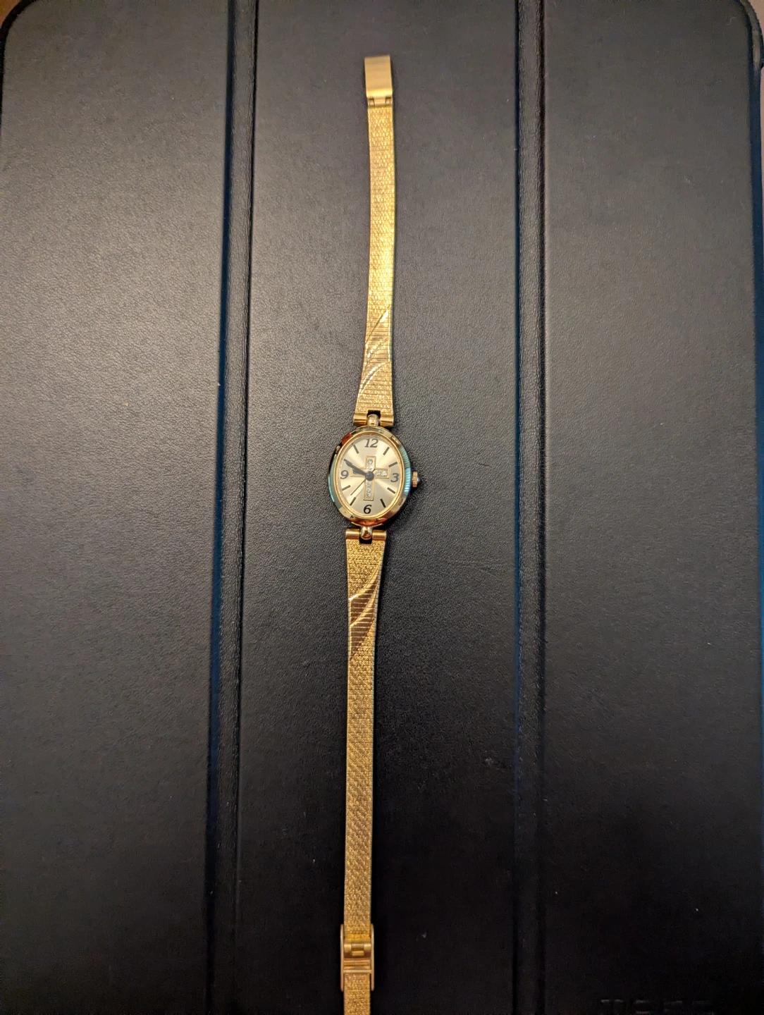 Women's Avon Rhinestone Cross Watch