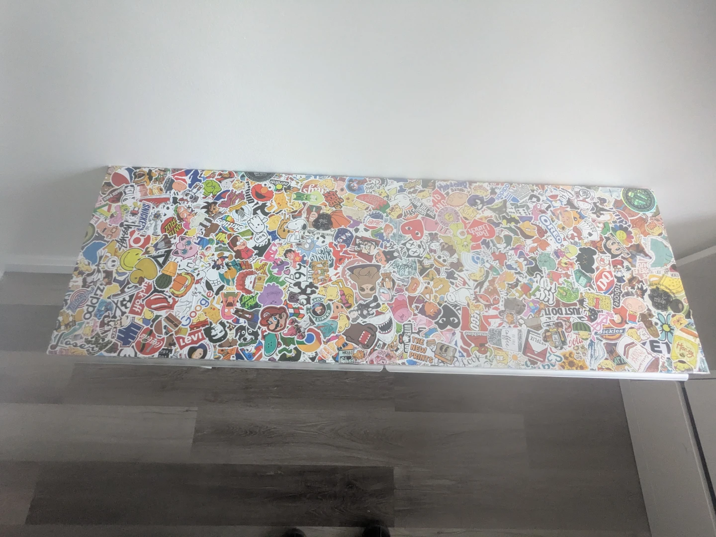 White desk with custom sticker-bombed top - photo 2