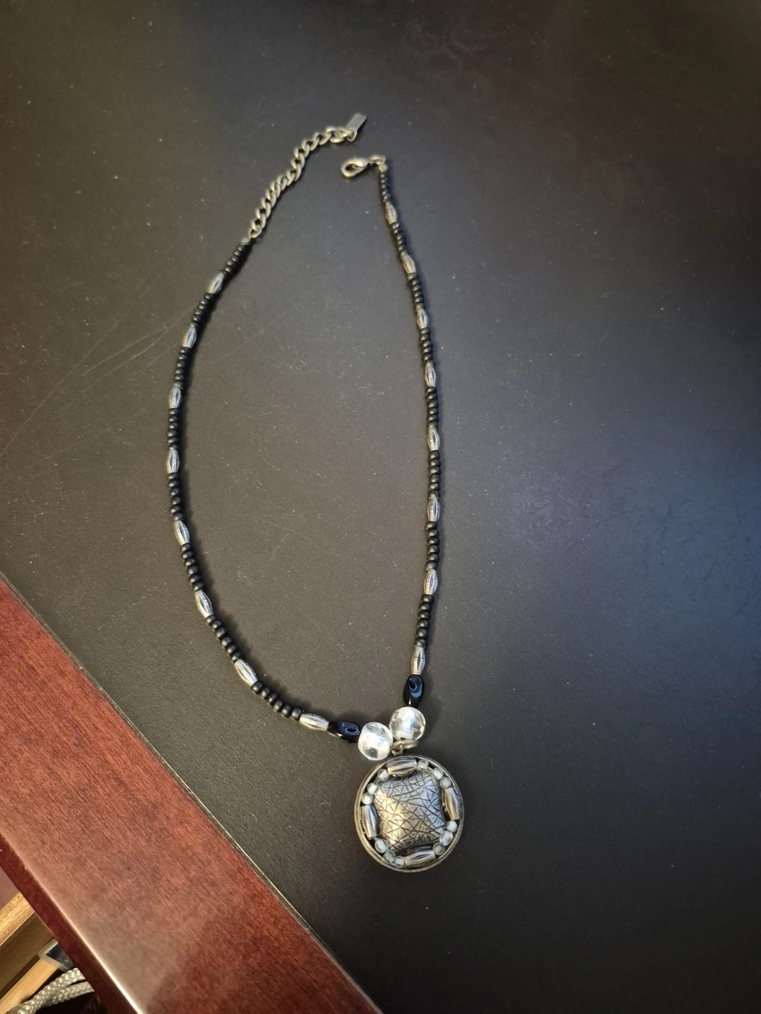 Black and silver bead necklace🏈