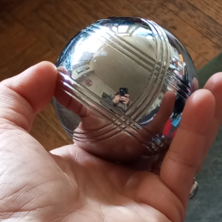 Single metal bocce ball