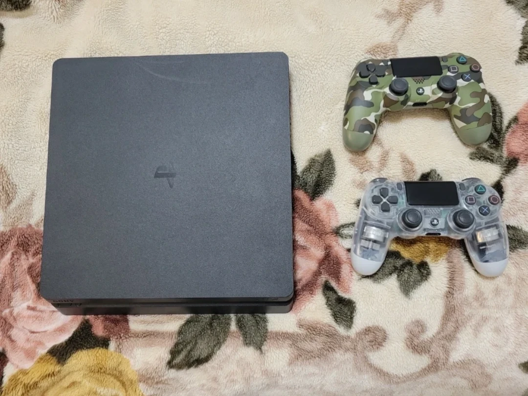 Sony PlayStation 4 Slim Console with 2 Controllers