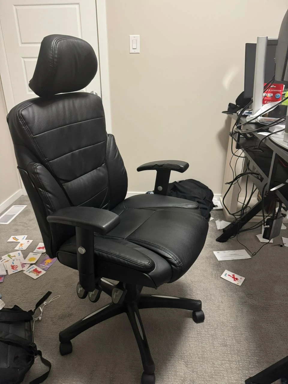 Ergonomic Black Leather Executive Office Chair with Headrest