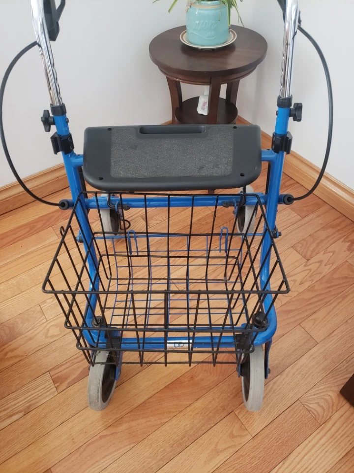 Blue Four-Wheel Rollator Walker with Seat and Basket