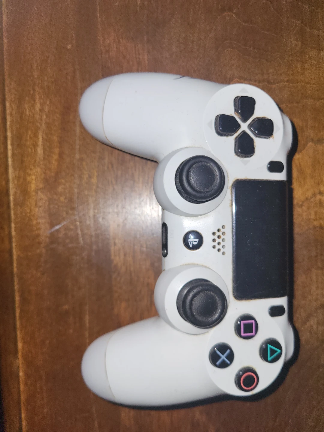 Used White PS4 Controller.