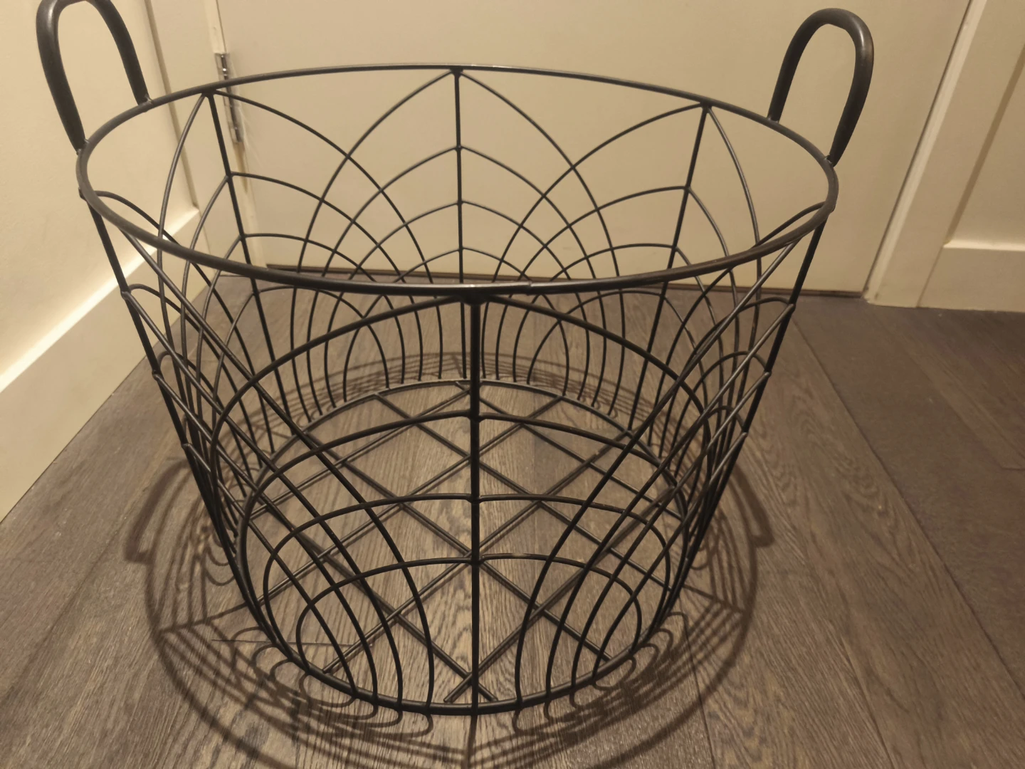 Large round metal laundry basket