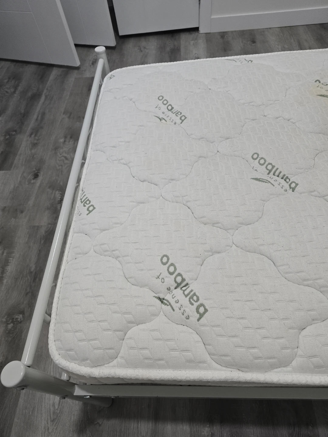 Used White Metal Twin Bed Frame and Bamboo Mattress - photo 4