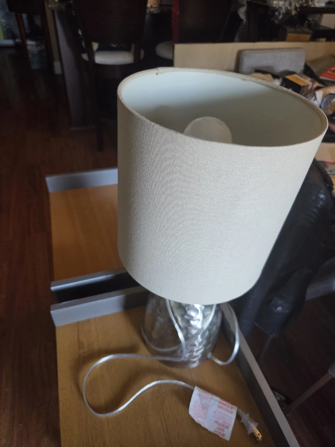 Table lamp with textured metal base