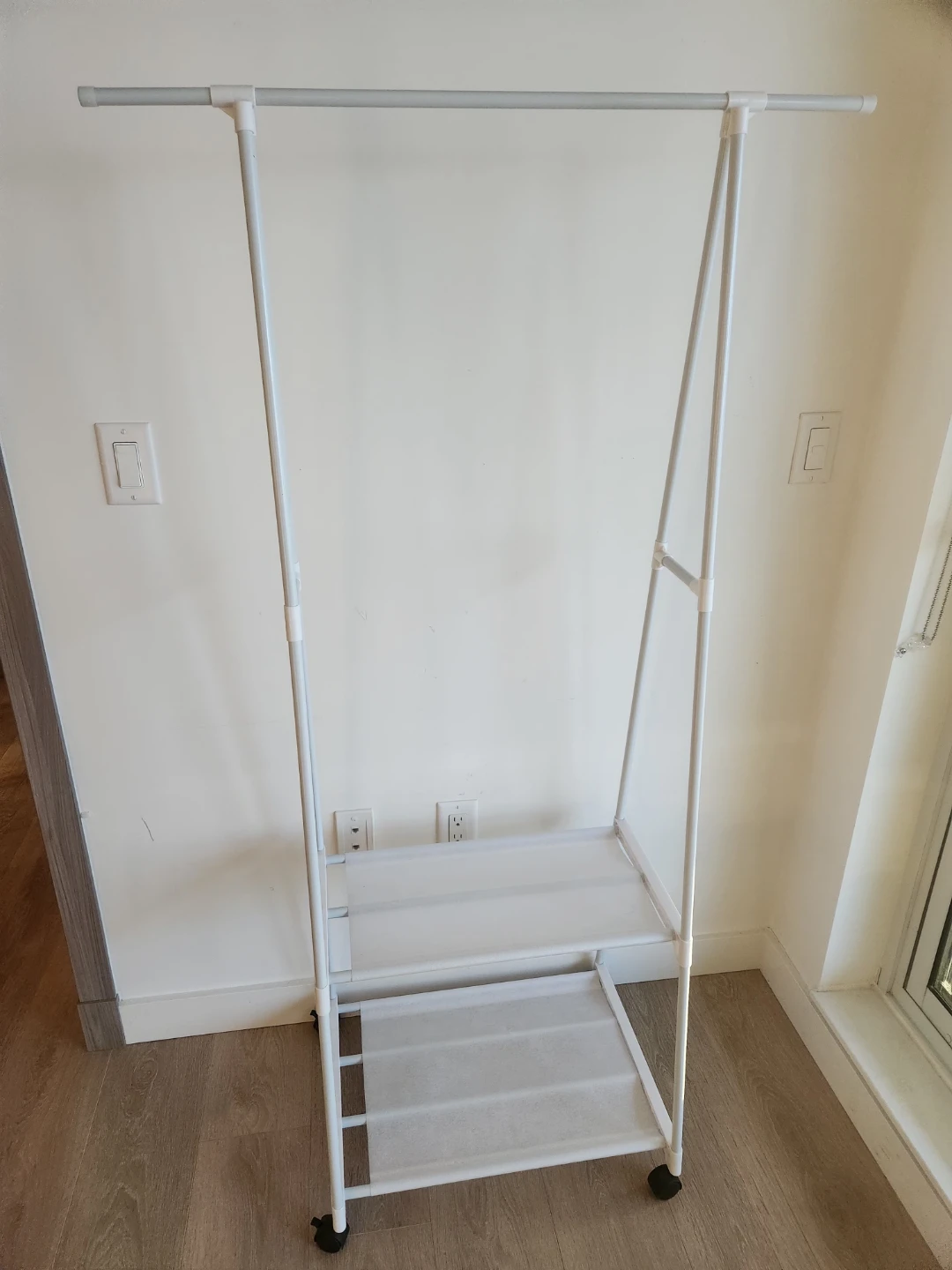 White Metal Rolling Garment Rack with Two Shelves
