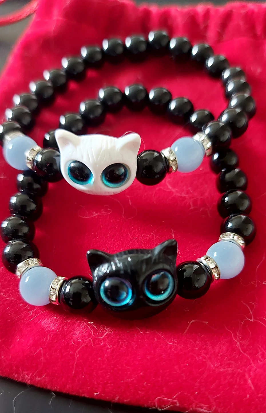 Set of two cat-themed beaded bracelets