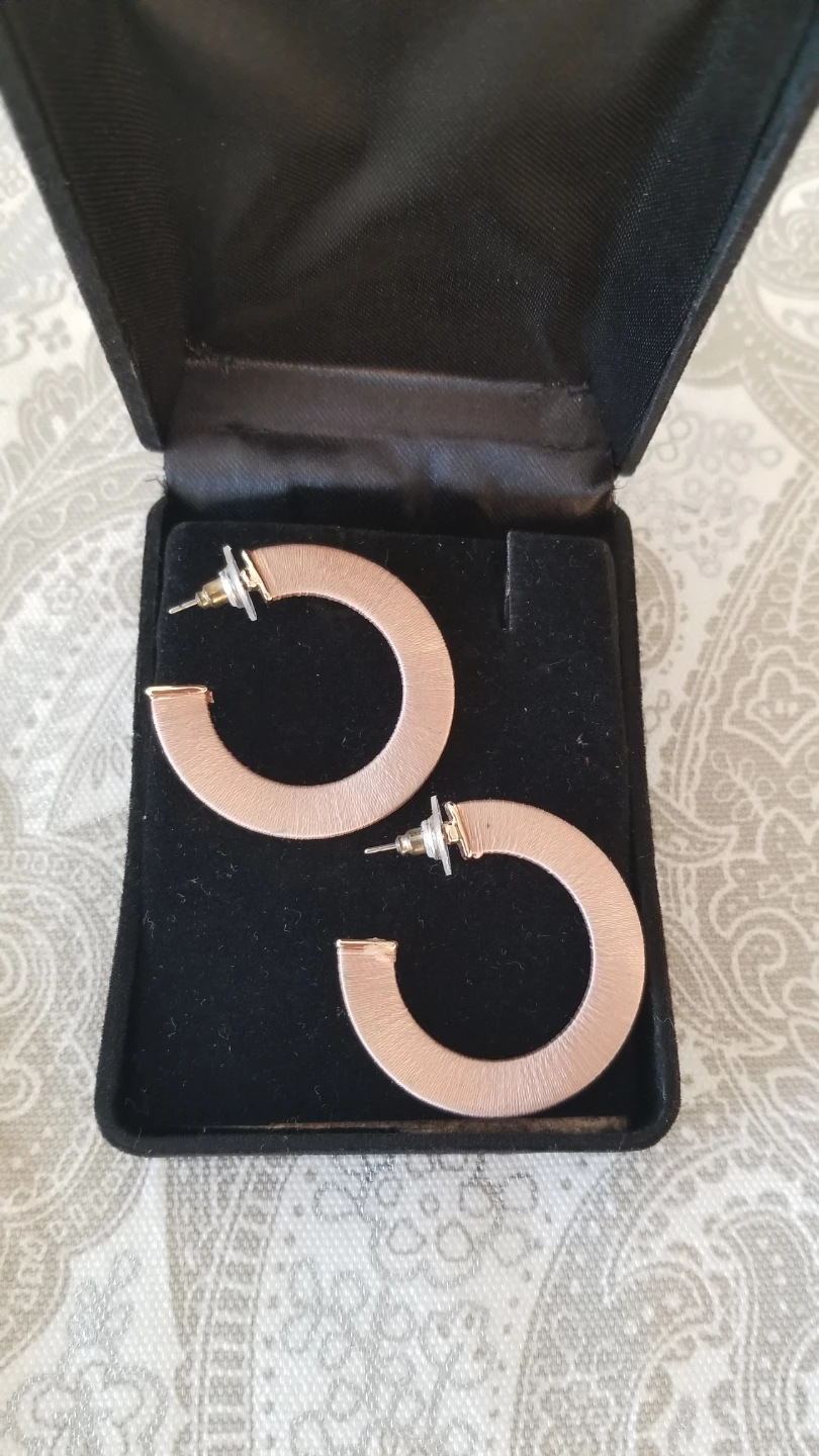 Rose gold tone hoop earrings
