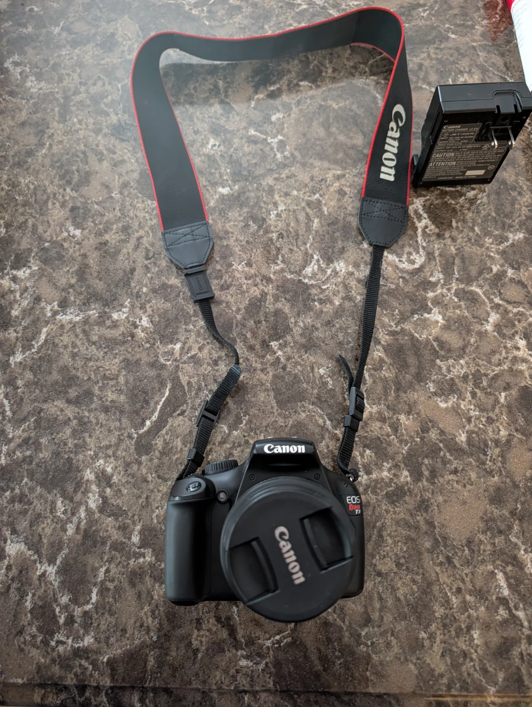 Canon EOS Rebel T3 Digital Camera with Charger and Strap