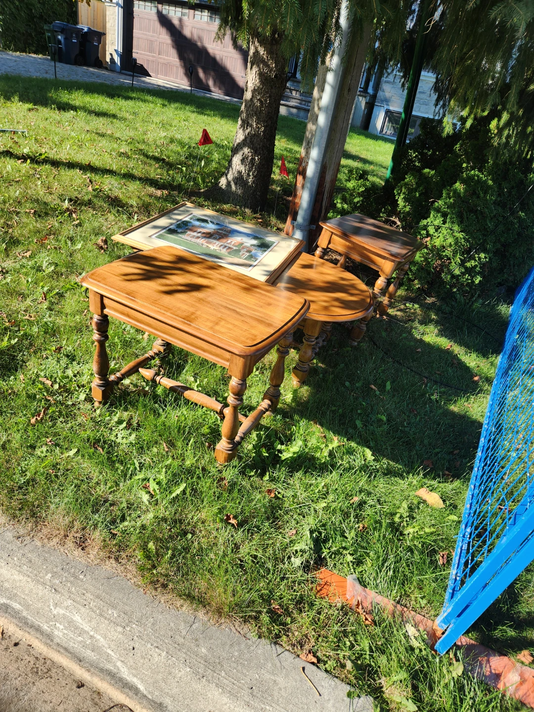 On the lawn at 47 Altamont Rd  3 wood side tables