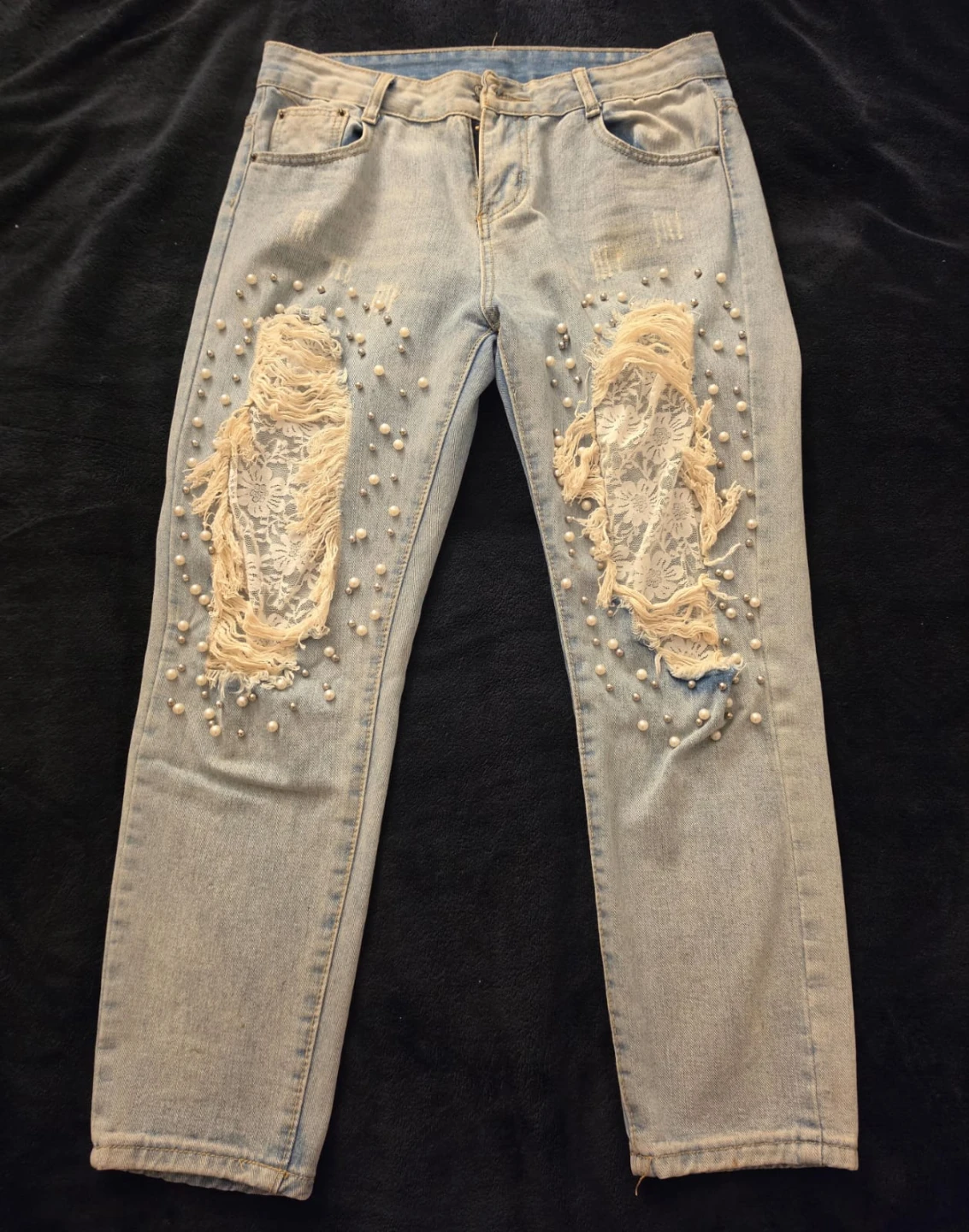 Light wash jeans with lace and pearls