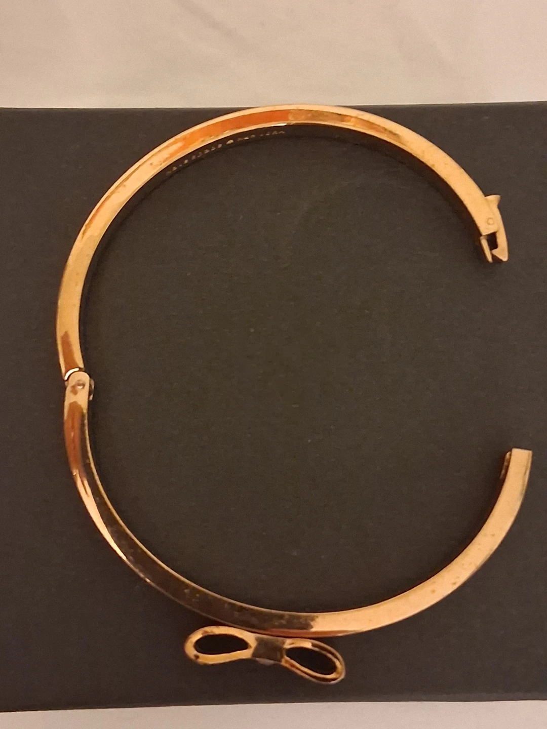 Kate Spade New York gold tone bow hinge bangle - photo 4