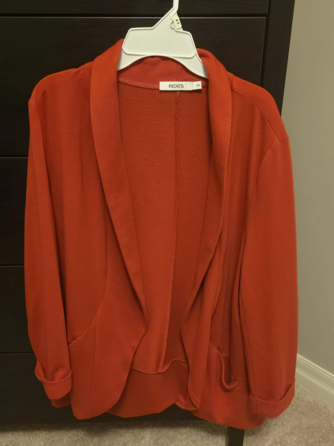Ricki's red open-front blazer 🏈