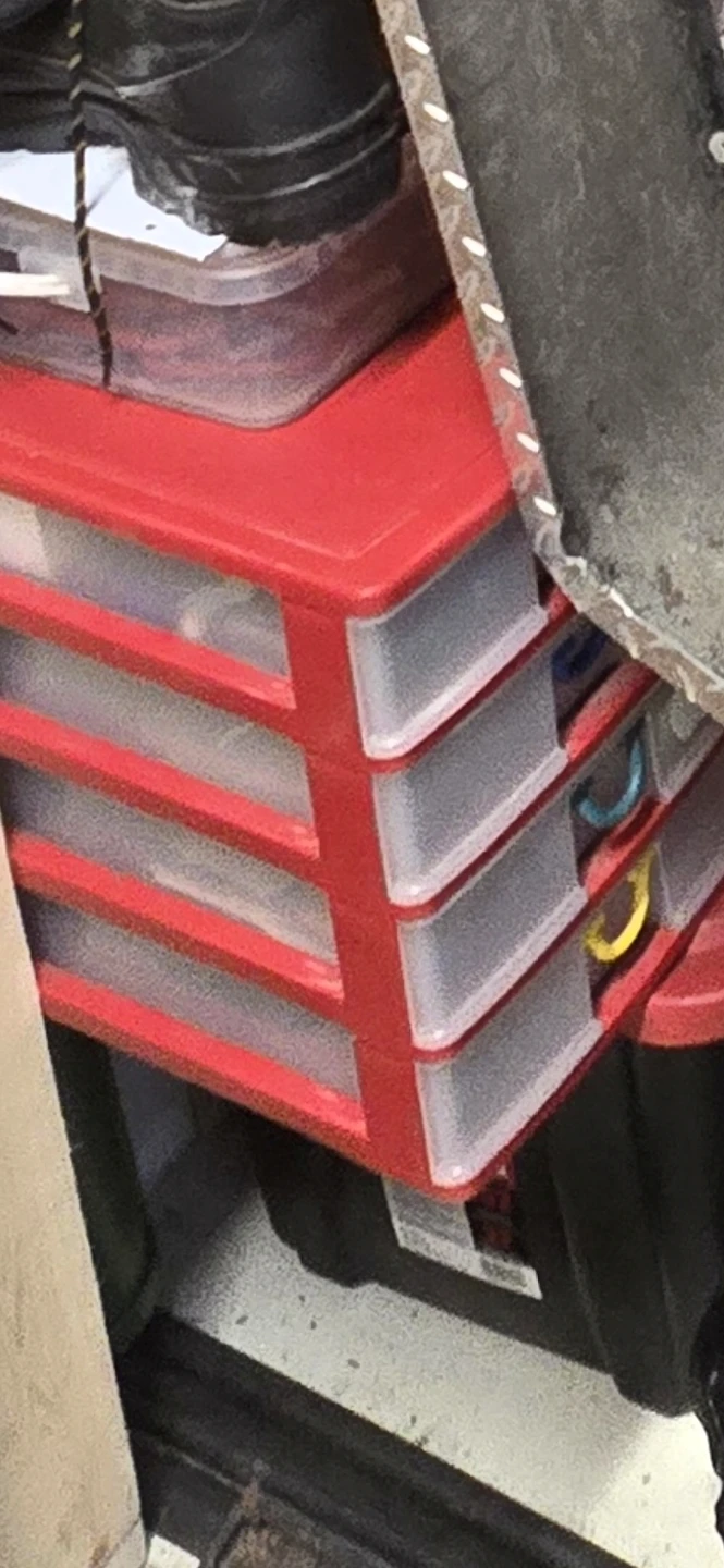 Red plastic storage drawer unit🏈