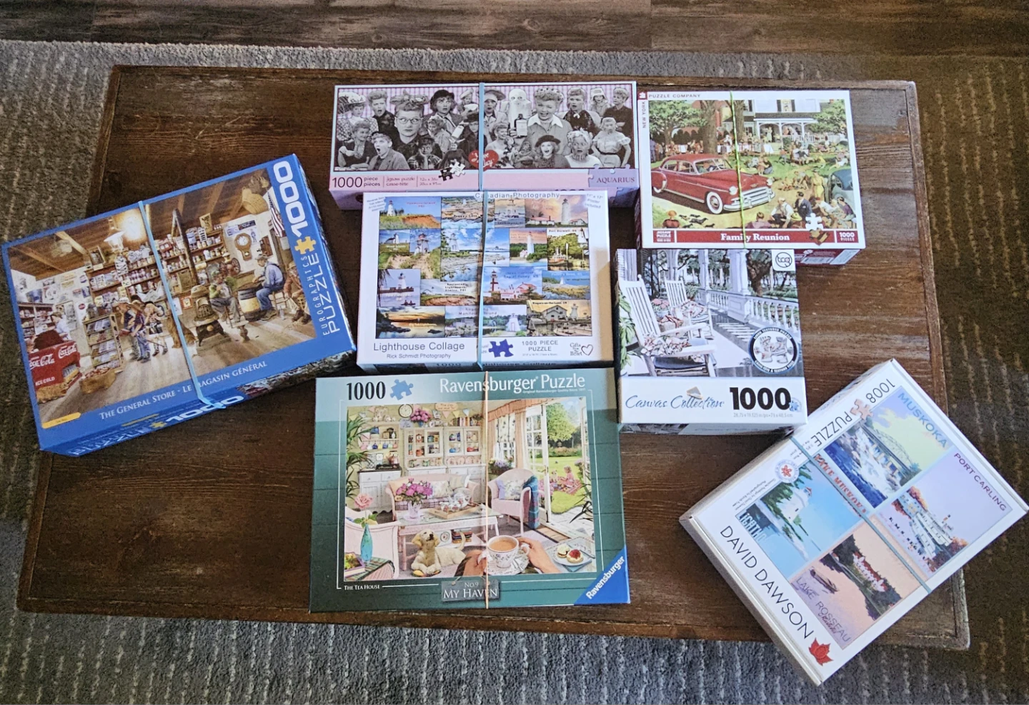 Collection of 7 Assorted 1000-Piece Puzzles