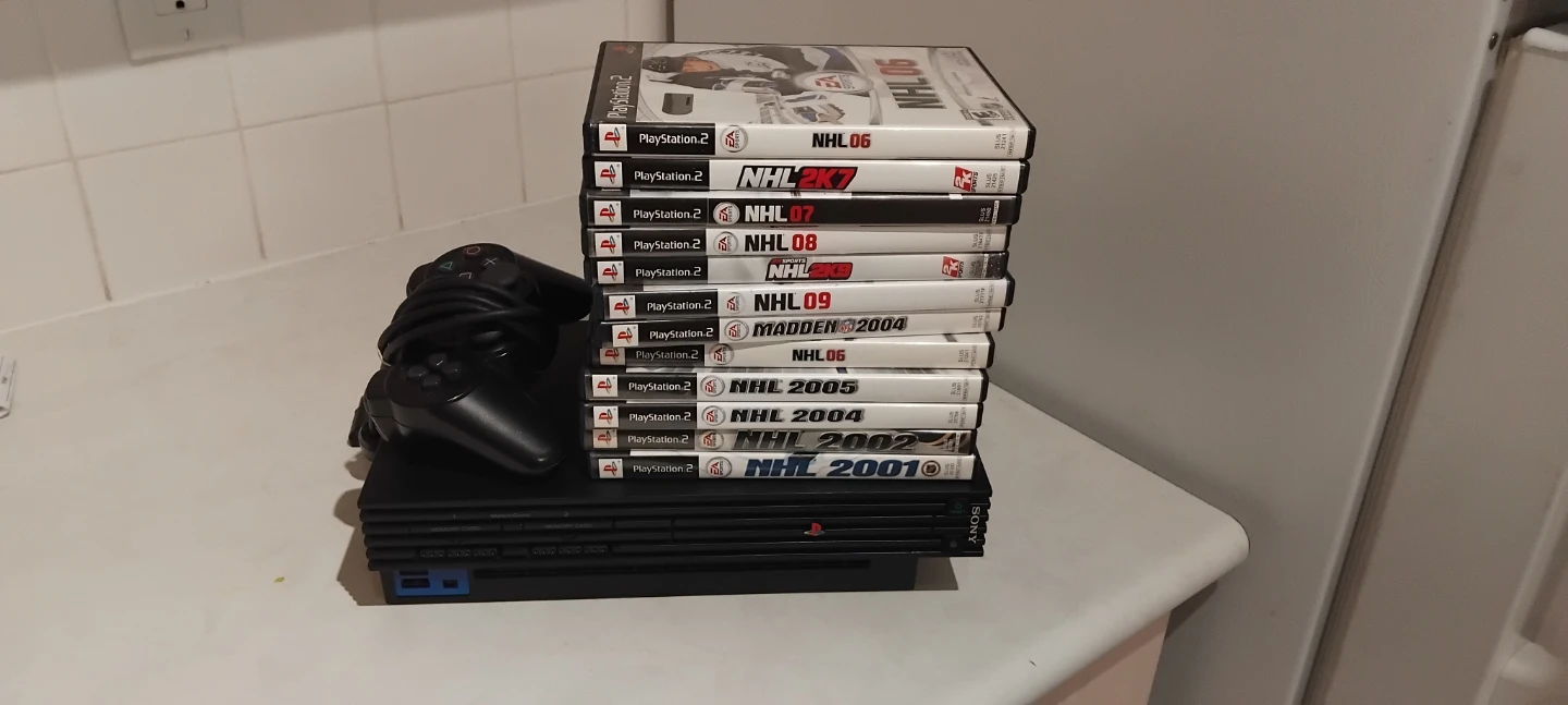 PlayStation 2 Console with 12 Sports Games