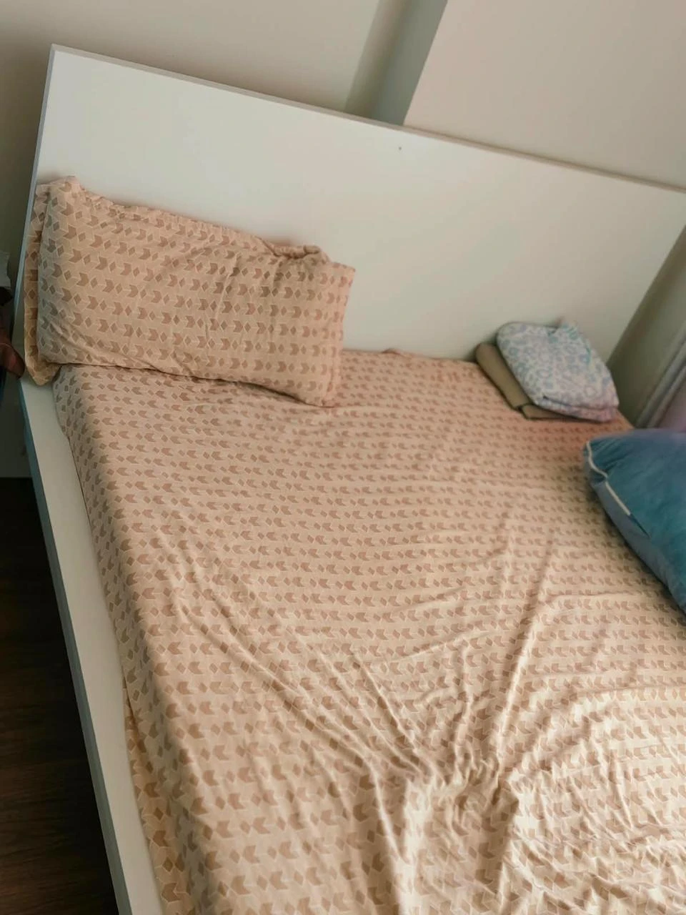 White Minimalist Double Bed Frame with soft mattress.